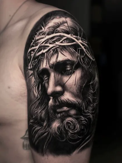 Tatuaje retrato realista de Jesucristo en blanco y negro por Goethe Ink