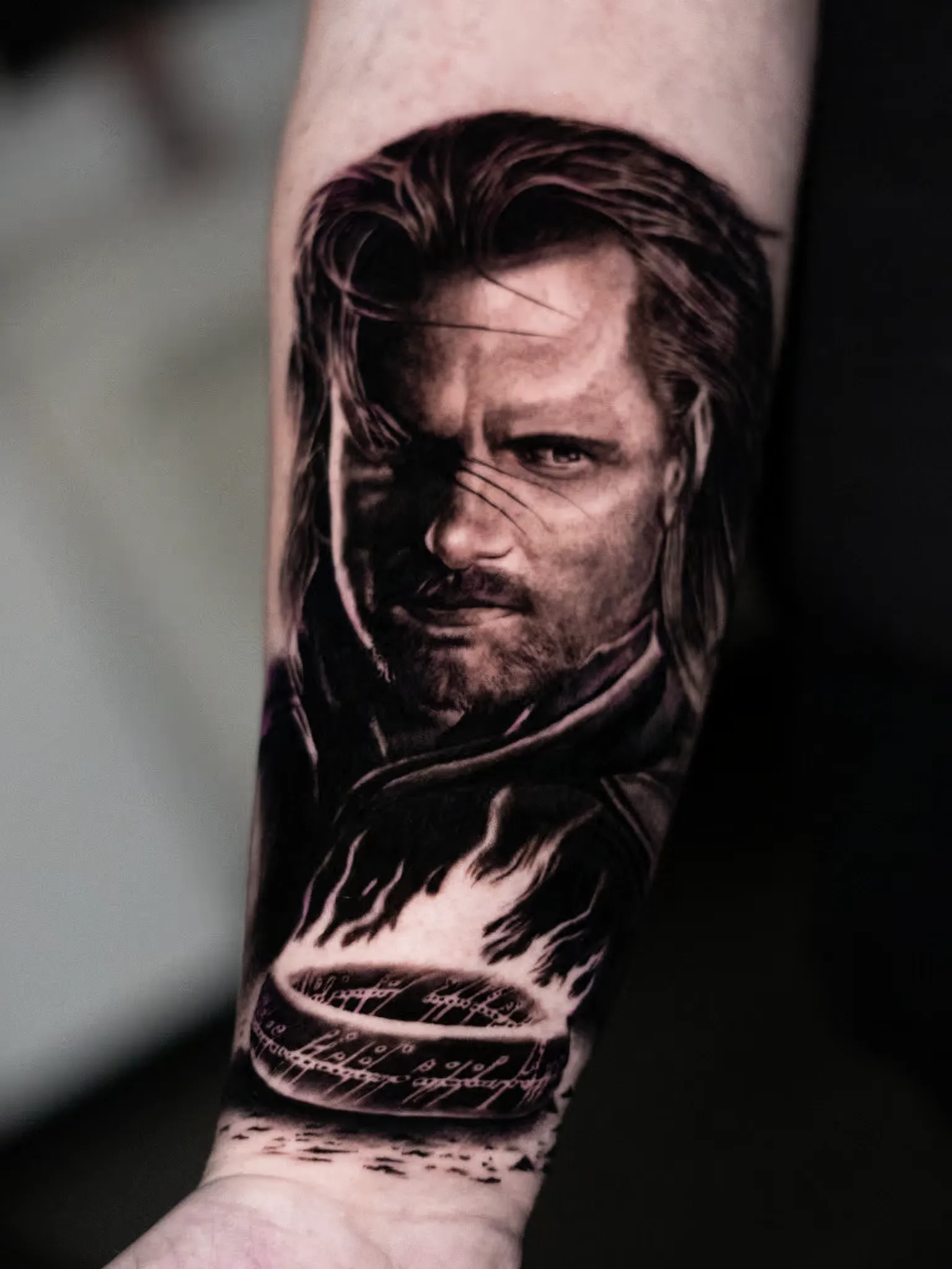 Realistic tattoo on forearm by Clayton Goethe