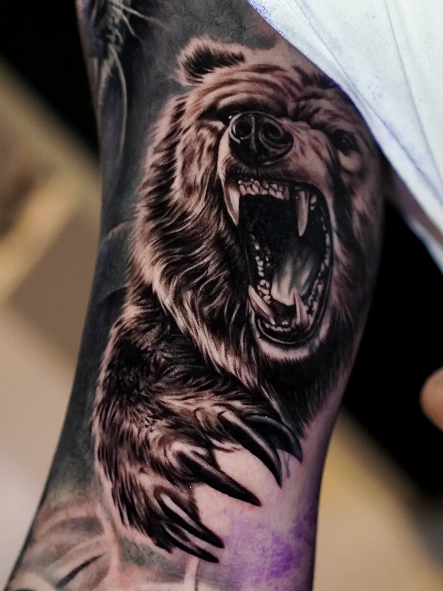 Realistic bear tattoo by Clayton Goethe