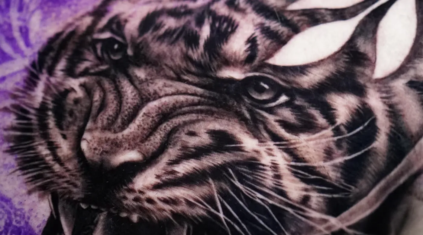 Black and grey realism tiger chest tattoo by Clayton Goethe in Barranquilla, Colombia
