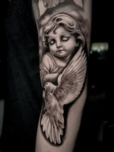 Tatuaje realista de angel hecho por Clayton Goethe en Goethe Ink, estudio de tatuajes